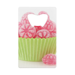 Raspberry tasty candy sweets in green cup cake credit card bottle opener