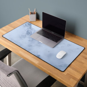 Ravens, snowy mountains and clouds desk mat