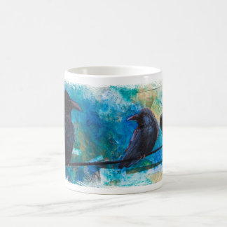 Ravens sur une tasse de fil