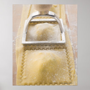 Ravioli with pastry cutter, close up poster