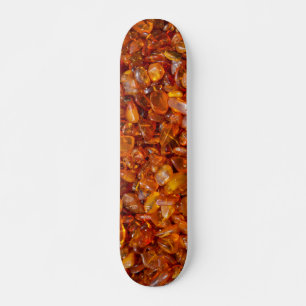 Raw amber pebbles skateboard