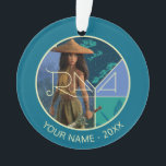 Raya Segmented Collage Ornament<br><div class="desc">Raya and the Last Dragon | Raya stands with her sword in front of her and her name written out,  segmenting the backgrounds of a forest,  graphic wave pattern,  and a floral icon.</div>