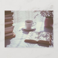 reading in bed cup of tea linen sheet literary