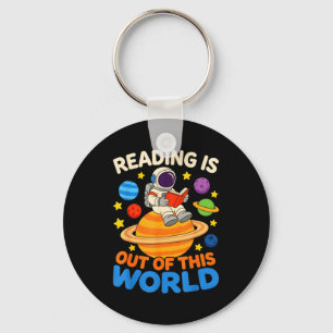 Reading is out of this world astronaut reading keychain