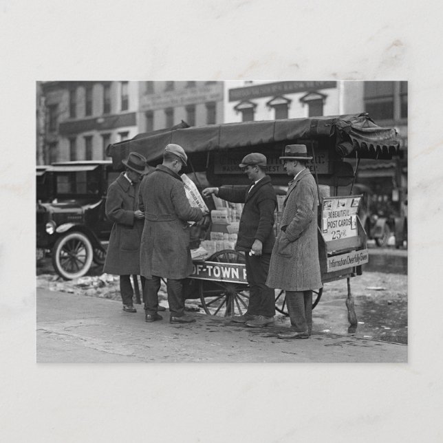 Reading The News, 1925 Postcard (Front)