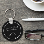 Real Estate Modern Black White Custom House Keychain<br><div class="desc">This modern realtor keychain is custom made with your realty company name under the the agent name in chic typography. This minimalist black and white key chain feature a simple line drawing of a house. Contemporary gift for an agent working to help you buy a home.</div>