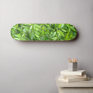 Realistic green leaves skateboard