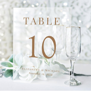 Réception de mariage chic numéro de table or givré