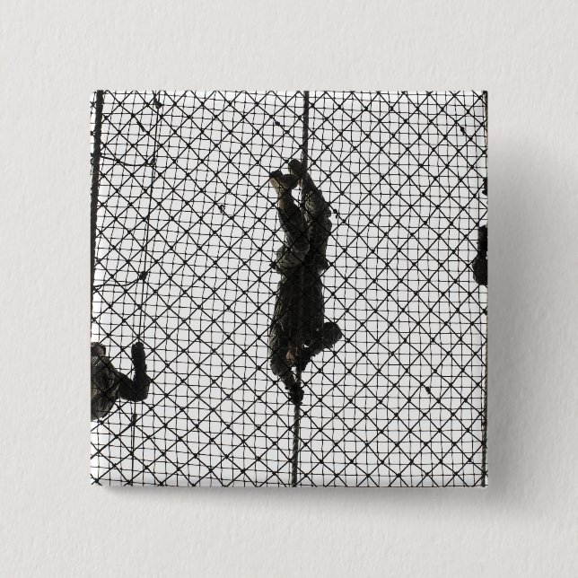 recruits completing an obstacle 2 inch square button (Front)