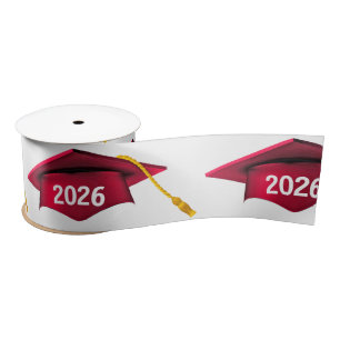 Red 2025 Graduation Caps On White Satin Ribbon
