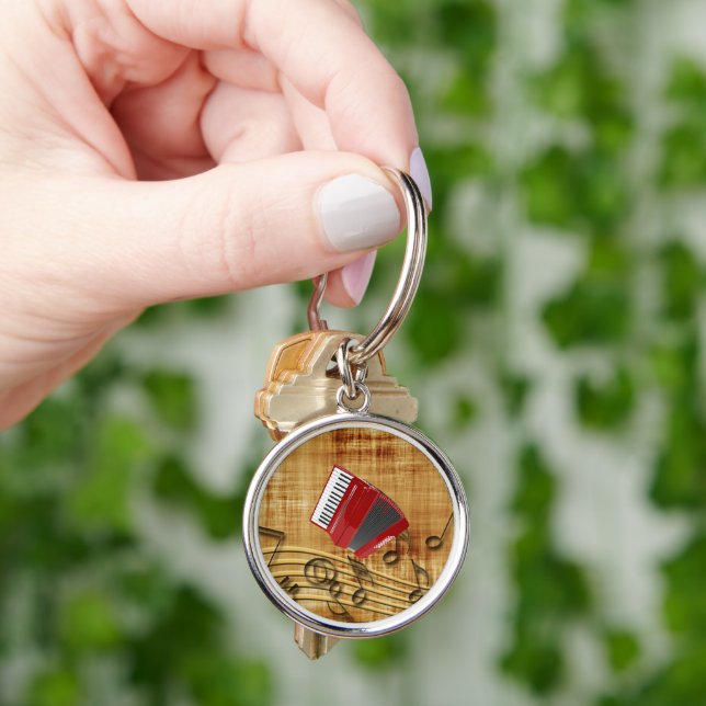 Red accordion, black notes, gold background keycha keychain (Hand)