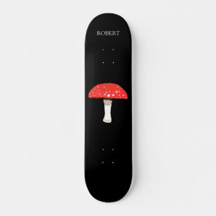 Red agaric fly mushroom with monogram skateboard