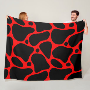 Red and black abstract giraffe pattern fleece blanket