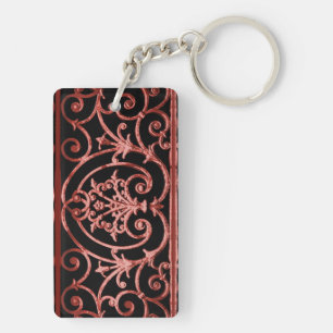 Red and black scrollwork pattern keychain