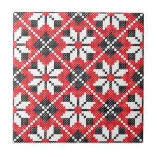 Red and black seamless cross-stitch pattern tile