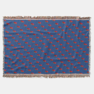Red and blue poppy flower on dark blue throw blanket