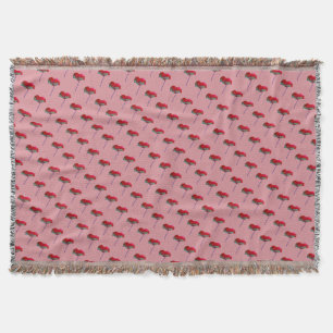 Red and blue poppy flower on pink throw blanket