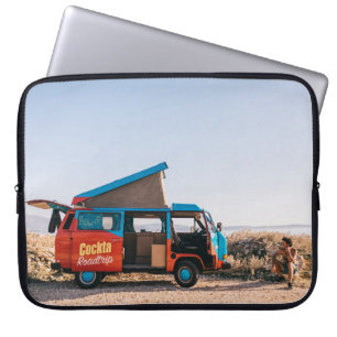 Red and blue vehicle beside man laptop sleeve