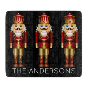 Red and Gold Nutcrackers on Black Personalize Cutt Cutting Board