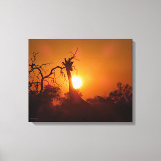 Red and gold sunset with a giraffe in sihouette canvas print