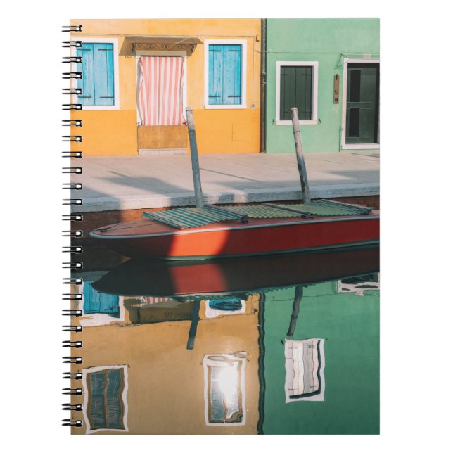 RED AND GREEN BOAT DOCKING ON DOCK NOTEBOOK (Front)