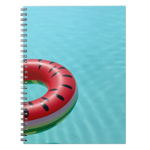 Red and green lifebuoy on swimming pool notebook