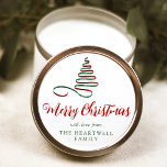 Red and Green Ribbon Tree Merry Christmas Script Classic Round Sticker<br><div class="desc">This modern holiday sticker features a red and green ribbon Christmas tree above the words "Merry Christmas" in stylish red calligraphy script. Personalize it with your family's name in green serif font.</div>