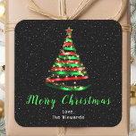 Red and Green Ribbon Tree Merry Christmas Square Sticker<br><div class="desc">This elegant and chic holiday sticker can be personalized with your family name. The design features a red and green ribbon Christmas tree with a star topper. The text combines handwritten script and modern sans serif fonts for a classy and sophisticated look. The falling snow, snowflakes and sparkles give a...</div>
