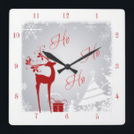 Red and Grey Ho Ho Ho Christmas Clock with Deer<br><div class="desc">This festive red, grey, and white "Ho Ho Ho" clock has a deer with antlers adorned with holly and berries, a red gift with ribbons, snowflakes, stars, and a variety of Christmas trees on a foggy grey winter background with a snowy border on it. It would make a lovely addition...</div>