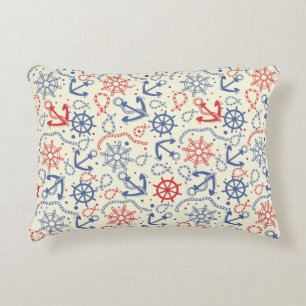 Red and navy background with anchor decorative pillow