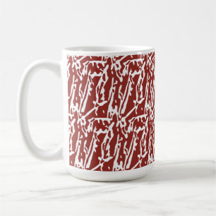 Red and orange abstract shapes blend and overlap a coffee mug
