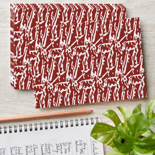Red and orange abstract shapes blend and overlap a envelope (Stacked)
