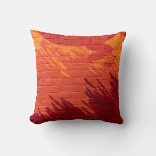 Red and orange painted brick wall throw pillow