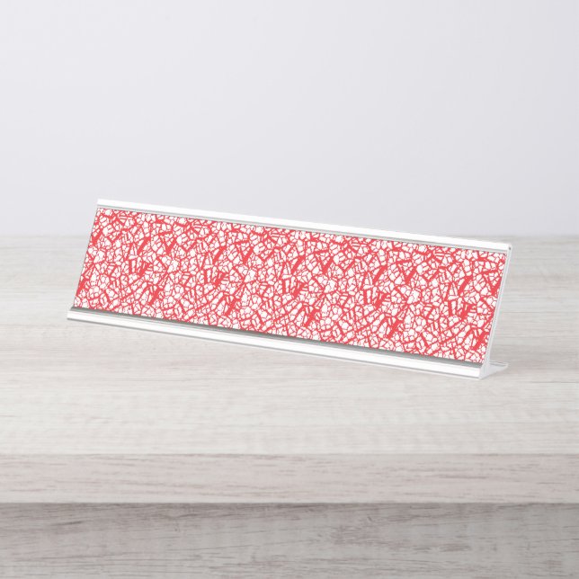 Red and orange wrapping paper with a geometric mot desk name plate (Front)
