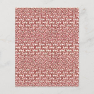 Red and pink textiles laid over a patterned rug wi flyer
