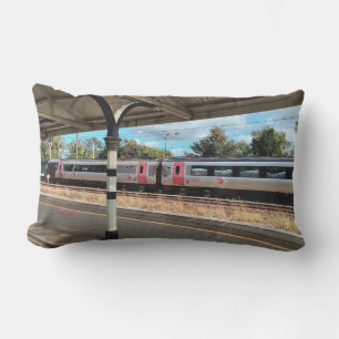 Red and silver train , at the station lumbar pillow