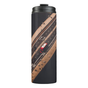 RED AND WHITE BUS RUNNING ON BRIDGE THERMAL TUMBLER