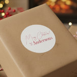 Red and White Christmas from Family Name Classic Round Sticker<br><div class="desc">Red Christmas design. Personalized with your family name. - Merry Christmas design in minimal, red and white with the message, "Merry Christmas! from the Johnsons". - Modern and stylish typography text templates ready for you to edit. - Ideal for your Christmas gift wrap, mailing accessories. envelope seals, and party favour...</div>