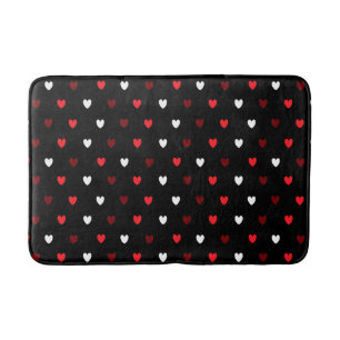 Red and white hearts on black bath mat