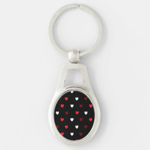 Red and white hearts on black keychain