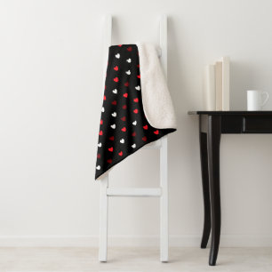 Red and white hearts on black sherpa blanket