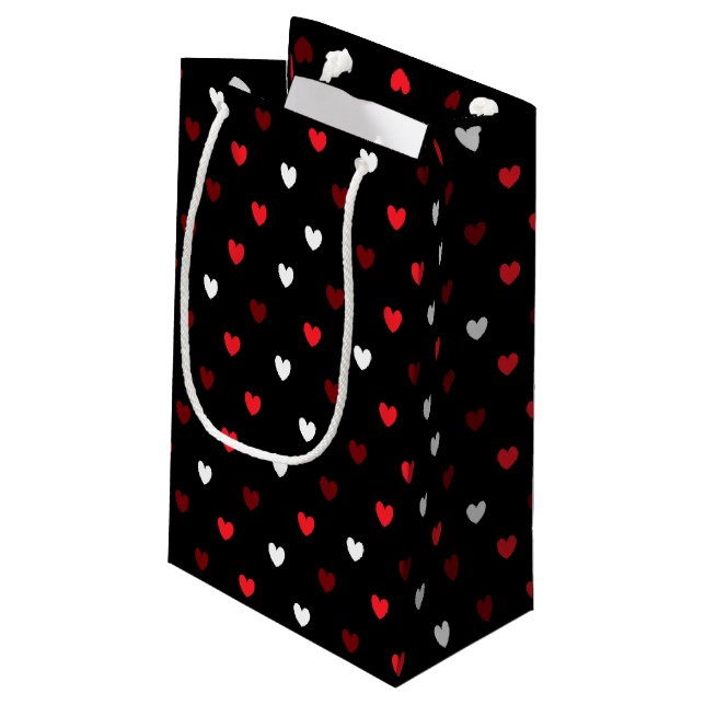 Red and white hearts on black small gift bag (Back Angled)