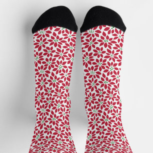 Red and white patterned socks in red leaf