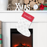 Red and White Snowflake Christmas Custom Small Christmas Stocking<br><div class="desc">Add a timeless touch to your Christmas home decor stocking with this elegant traditional design. Featuring a red and white pattern with silver winter snowflakes, it blends festive Xmas style with traditional snow design for a cozy holiday look. The classic calligraphy script and stylish typography enhance its charm, while the...</div>