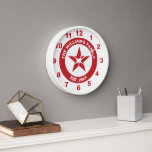 Red and White Star Retro Advertising Style Clock<br><div class="desc">This clock in red and white was inspired by vintage gasoline advertising designs. It has a red star shape at the centre that can be personalized with an initial, and a red ring that can be personalized with your family name and your "established" date or any custom text you choose....</div>