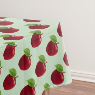 Red Apples on Light Green Tablecloth