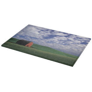 Red barn in wheat & barley field in Whitman Cutting Board