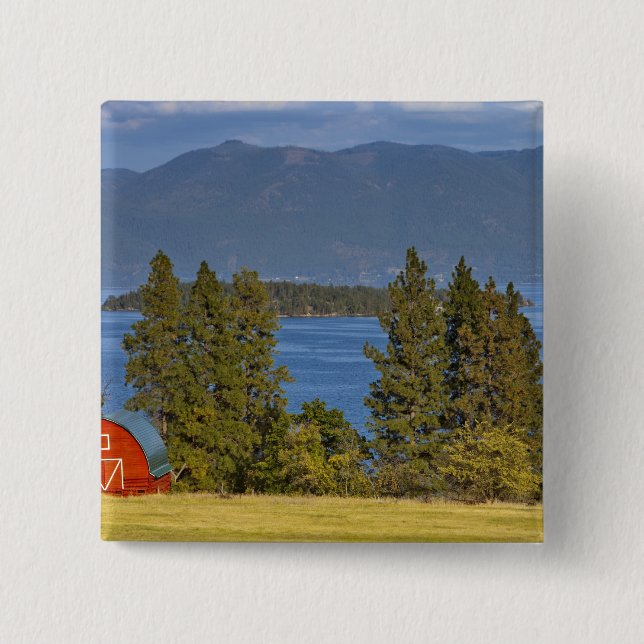 Red barn sits along scenic Flathead Lake near 2 Inch Square Button (Front)