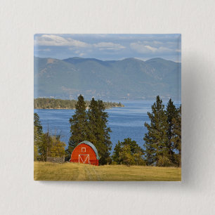 Red barn sits along scenic Flathead Lake near 2 Inch Square Button