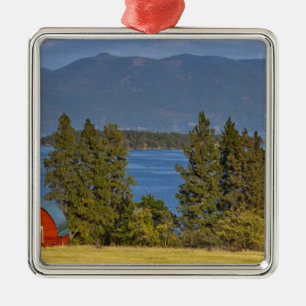 Red barn sits along scenic Flathead Lake near Metal Ornament